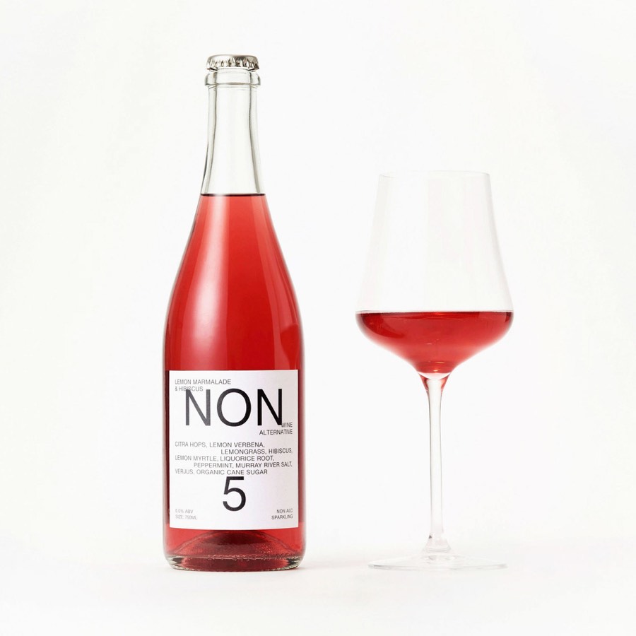 NON 5 bottle beside a poured glass