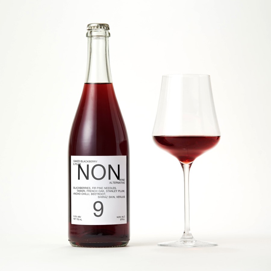 NON 9 bottle beside a poured glass